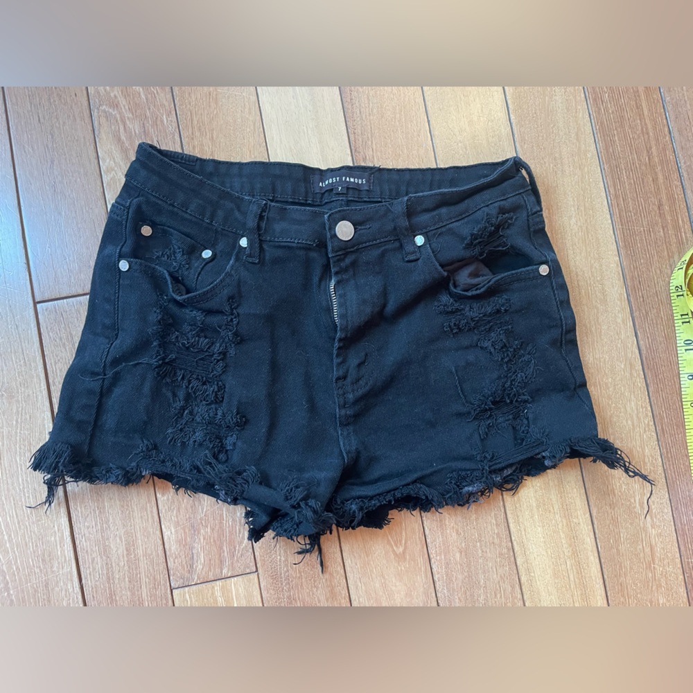 Almost Famous distressed black denim shorts with frayed hems Juniors Size 7